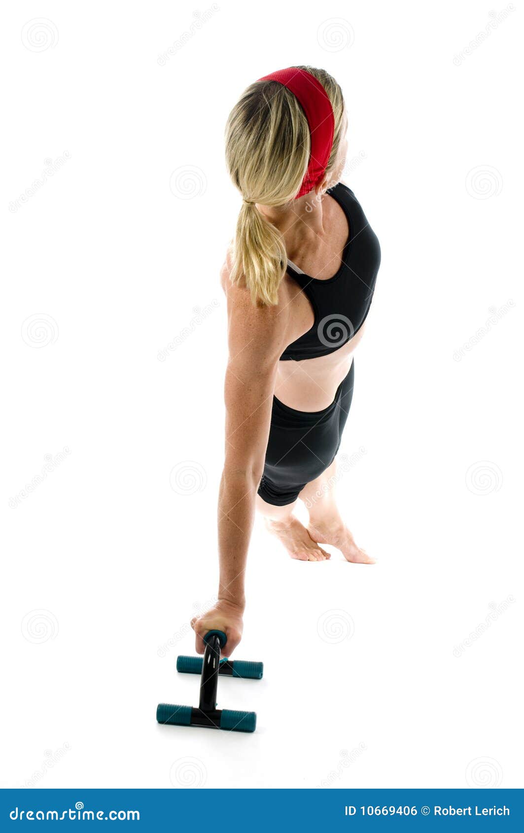 young man practicing low push up plank pose on stands, and women sitting in  half lotus pose Stock Photo by LightFieldStudios