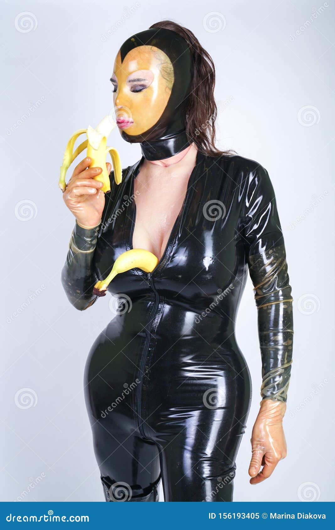 Latex Fetish Plus Size Person with Banana on White Isolated Studio
