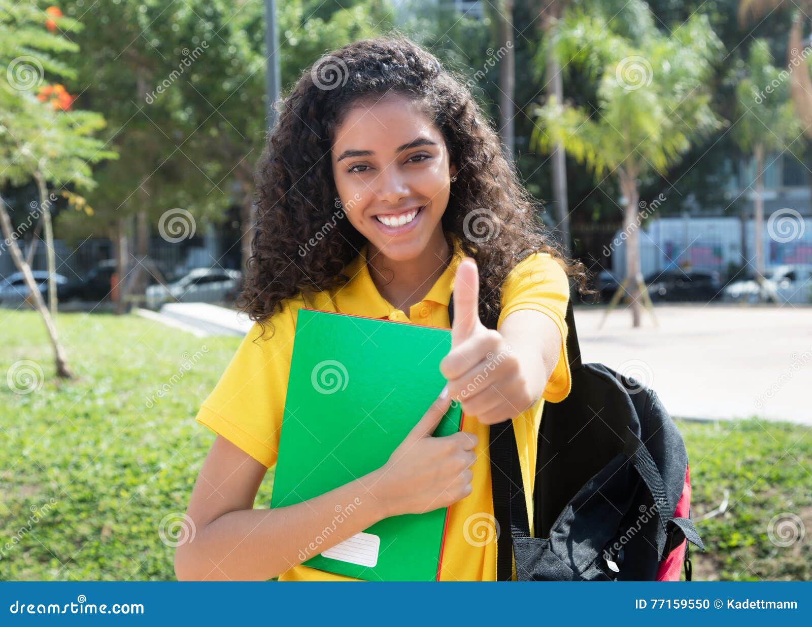 Latin American Female Student With Long Dark Hair Showing Th