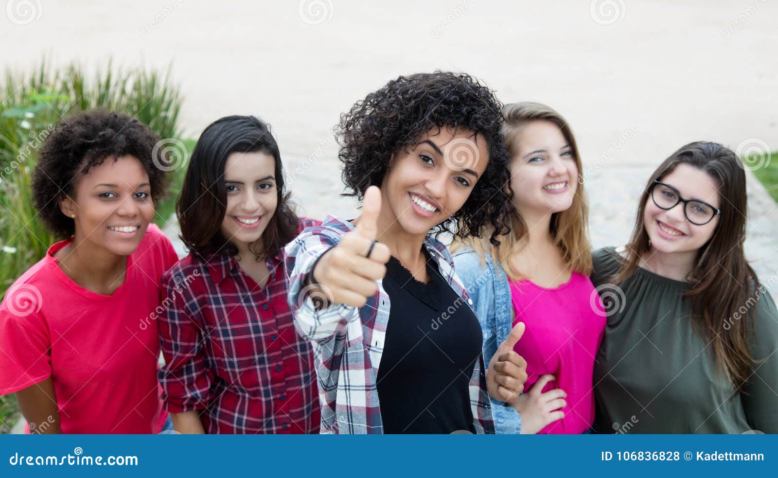 https://thumbs.dreamstime.com/z/latin-american-woman-showing-thumb-group-girlfriends-latin-american-women-showing-thumb-group-girlfriends-outdoors-106836828.jpg