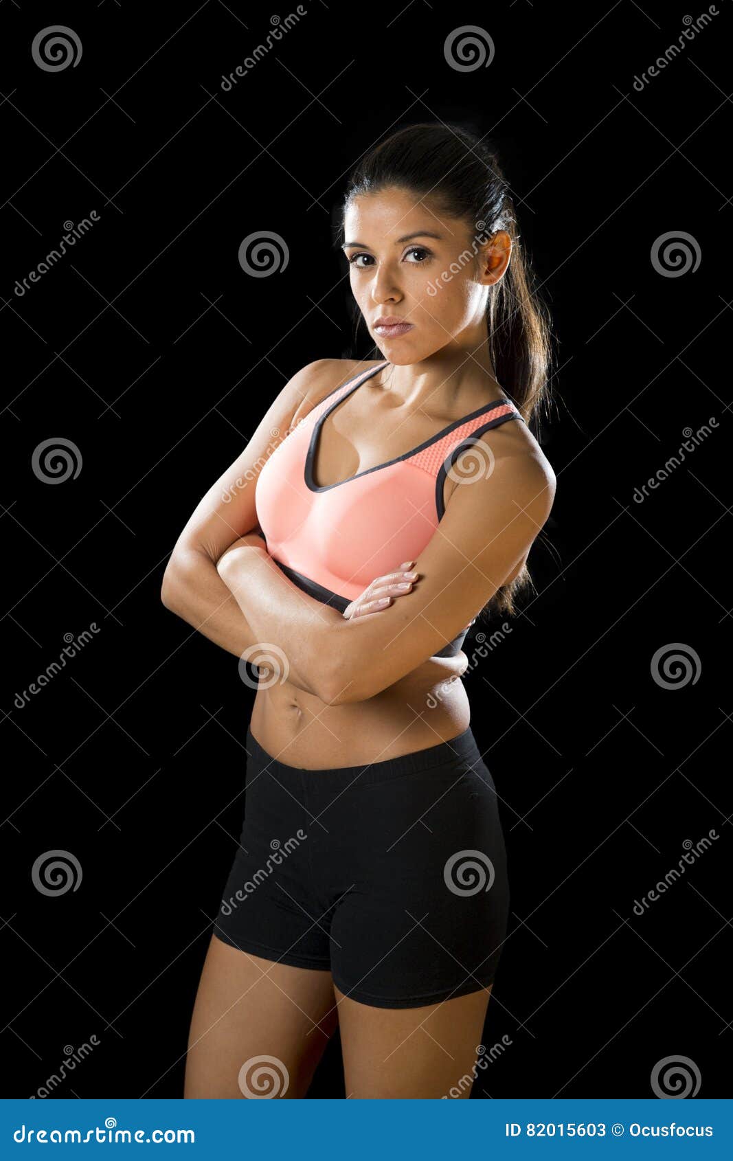 Latin Sport Woman Posing In Fierce And Badass Face Expression With Fit