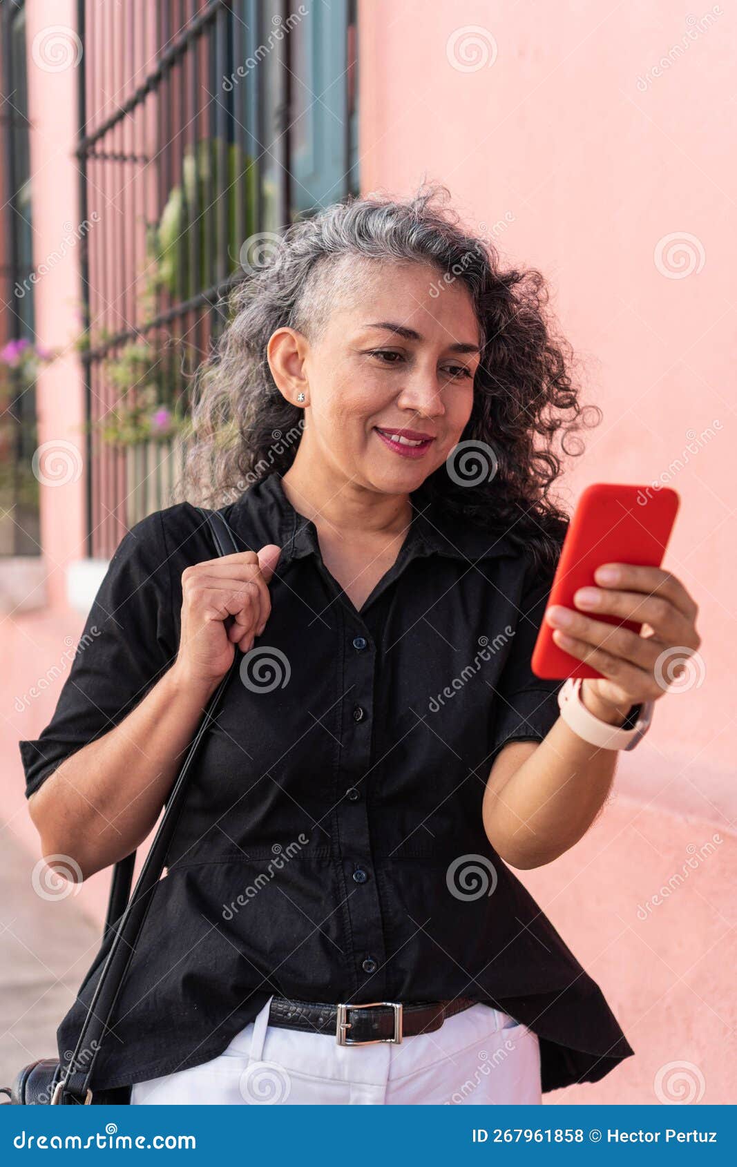 Latin Woman Using Mobile Phone in the Street Stock Photo Image of
