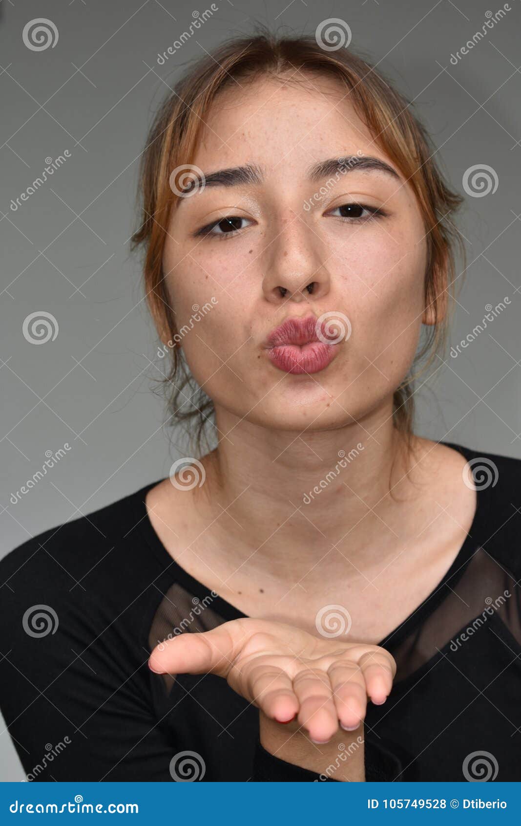 Latina Girl Blowing A Kiss Stock Photo I