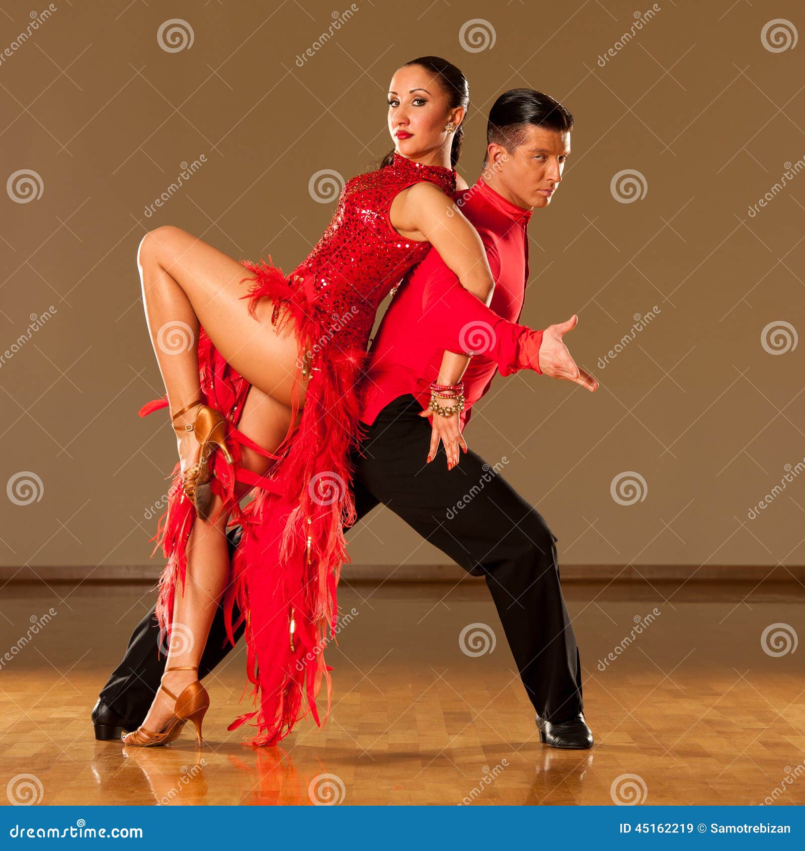 latino dance couple in action - dancing wild samba