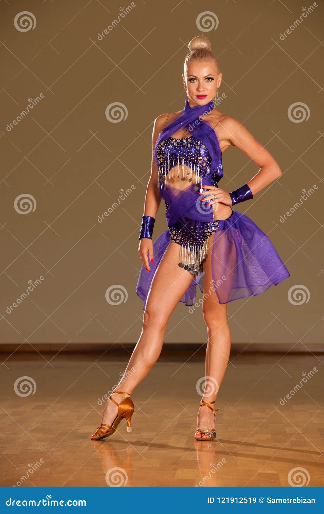 latino dance couple in action preforming a exhibition dance - w