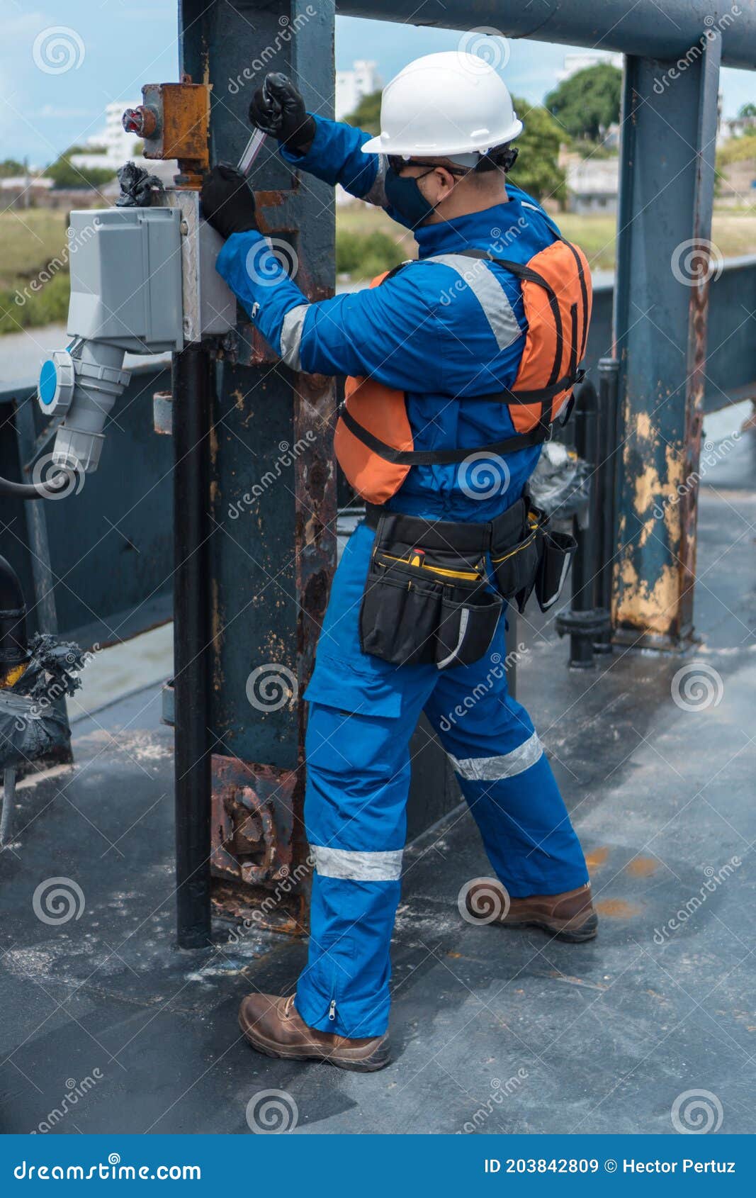 Latino Marine Engineering Officer on the Ship with Protective Mask. Works  on the Ship with Correct Tools and Equipment Stock Image - Image of  engineer, mechanic: 203842809