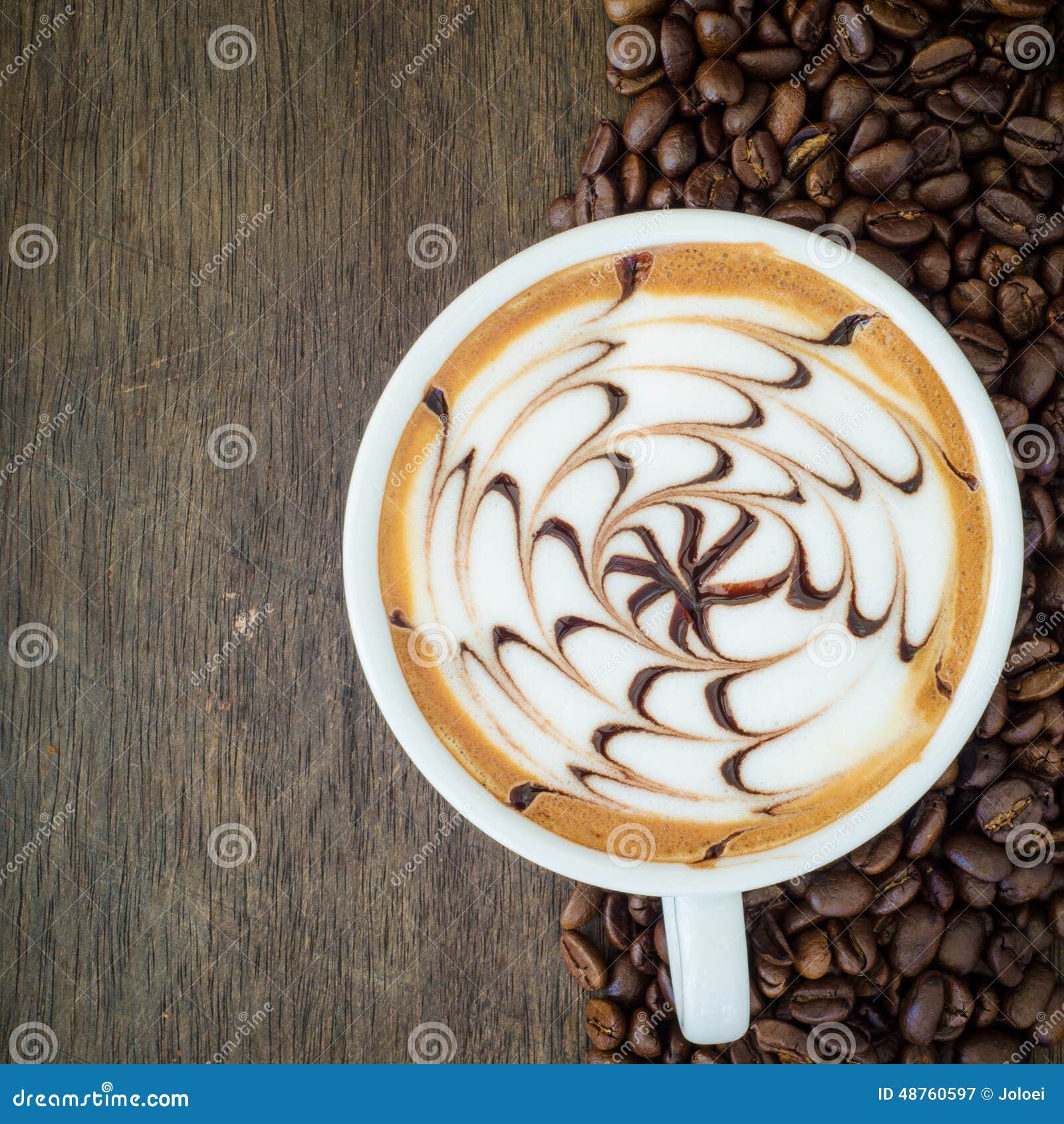 Latte art and coffee bean stock image. Image of bean 48760597