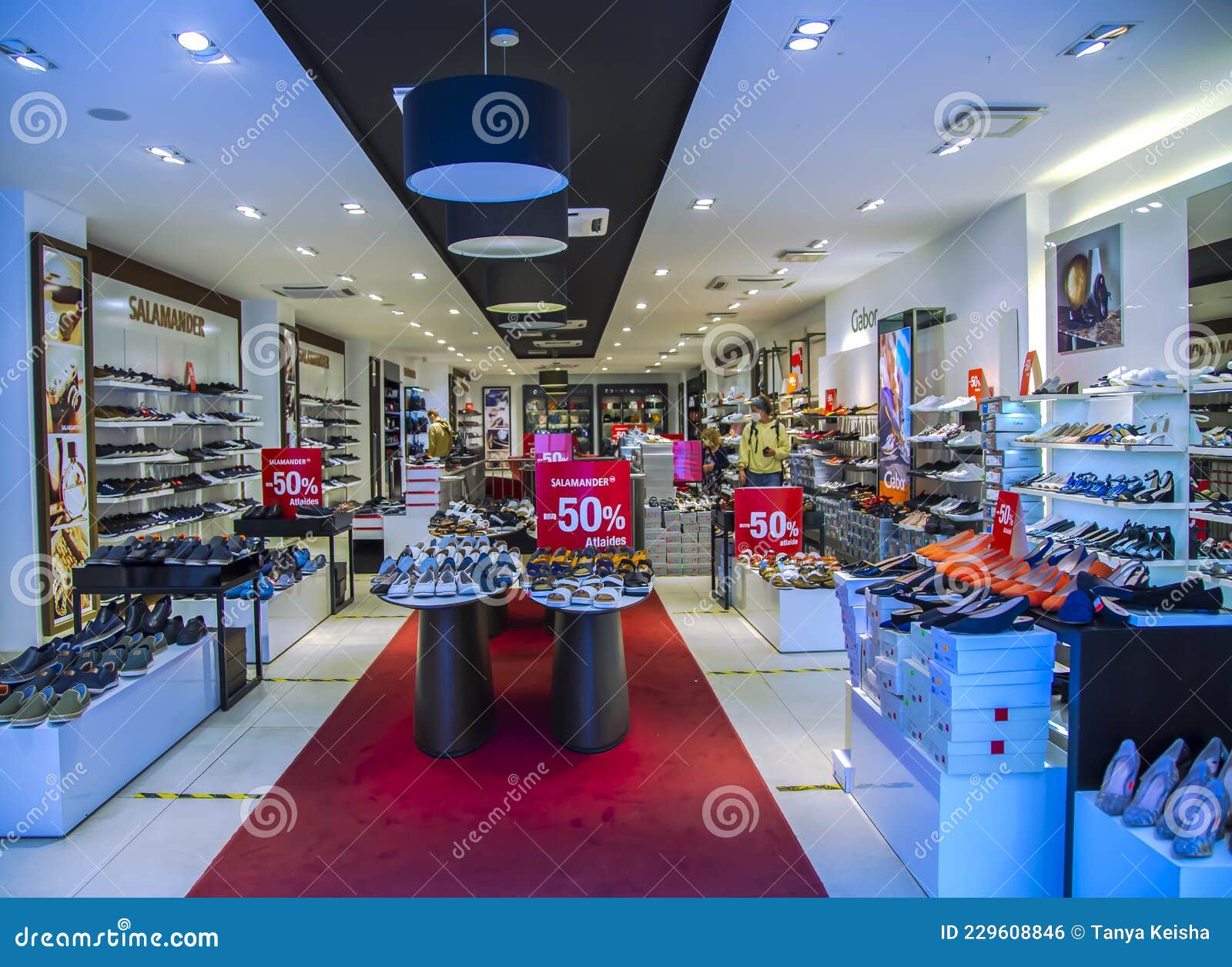 Shelves with Variety Brands of Quality Shoes with Big Discounts ...