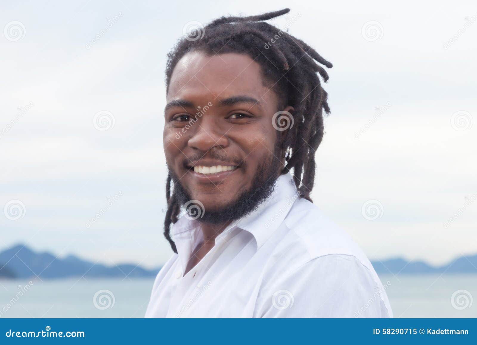 Laughing African American Guy With Dreadlocks And White