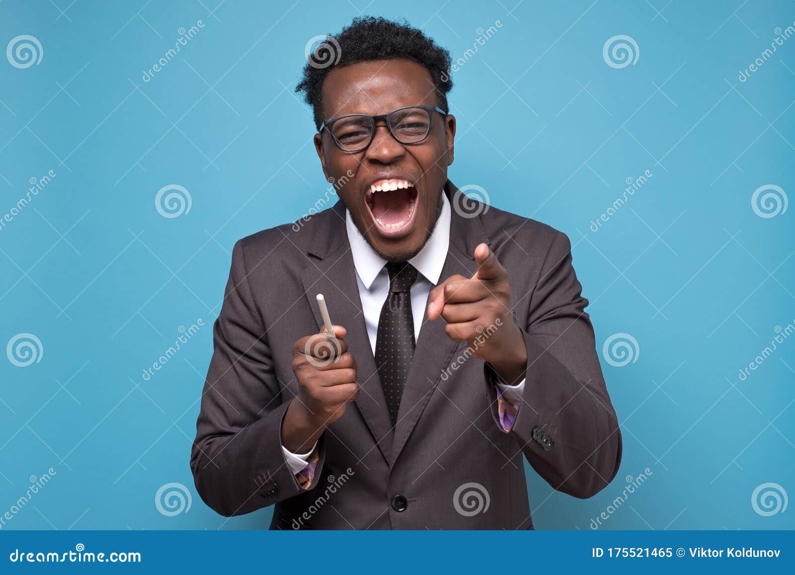 Laughing African American Man is Laughing on Your Joke Over Blue ...