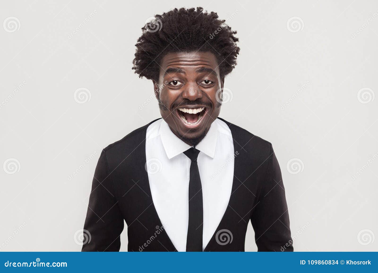 Laughing Afro Businessman Looking at Camera and Toothy Smiling. Stock ...