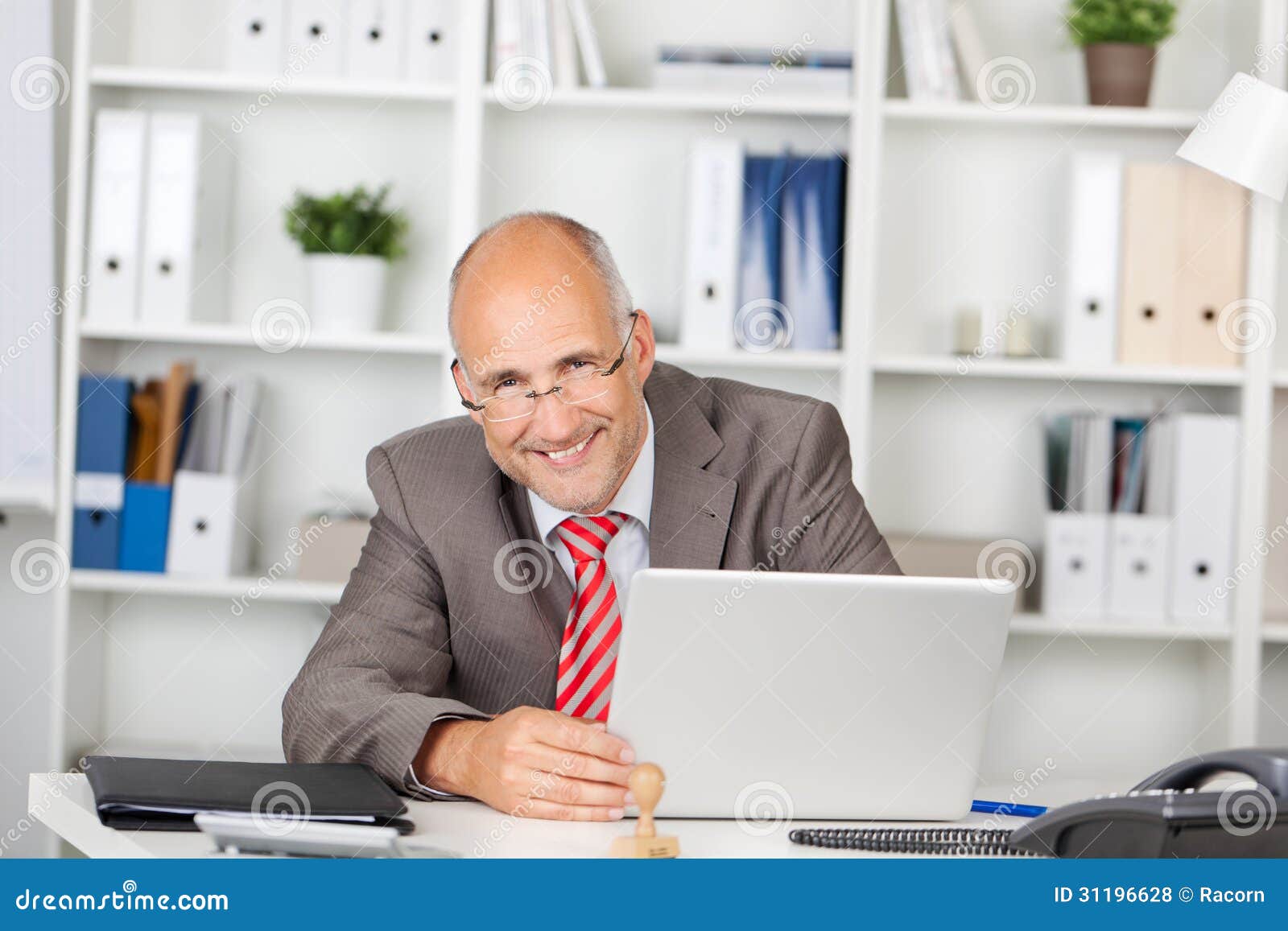 Laughing Businessman with Laptop Stock Photo - Image of professional ...