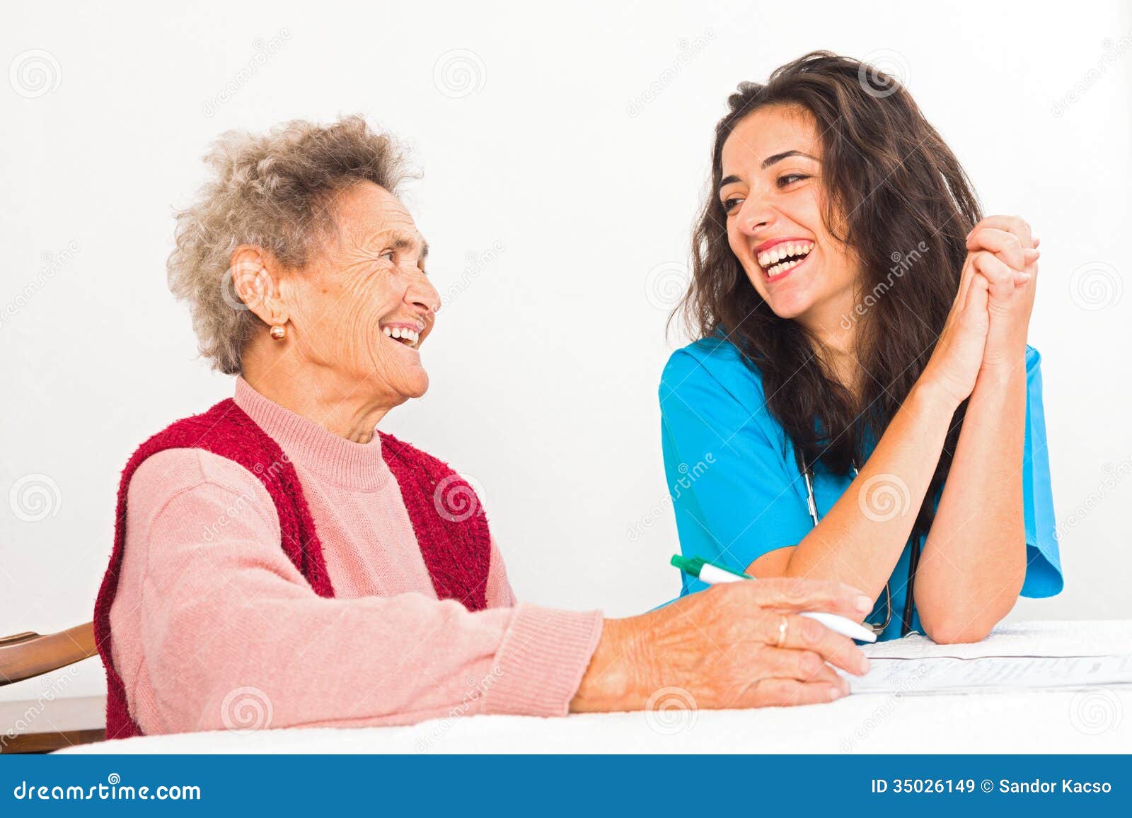 laughing elderly and nurse