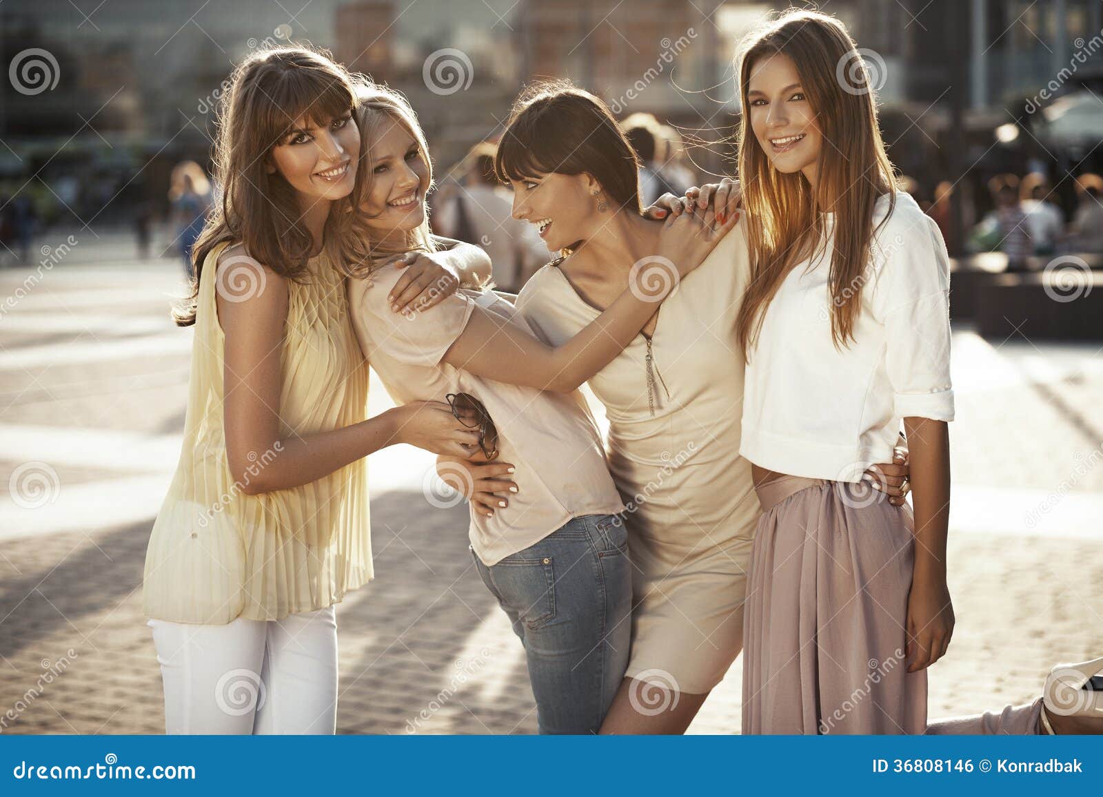 laughing girlfriends playing funny jokes