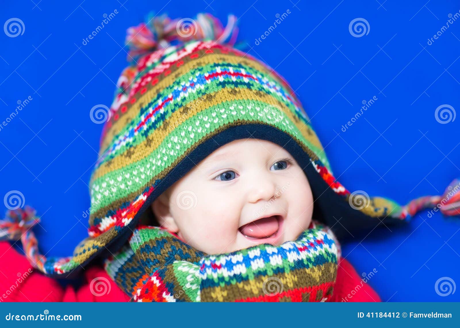 Laughing Happy Baby Wearing a Funny Knitted Hat an Stock Photo - Image ...