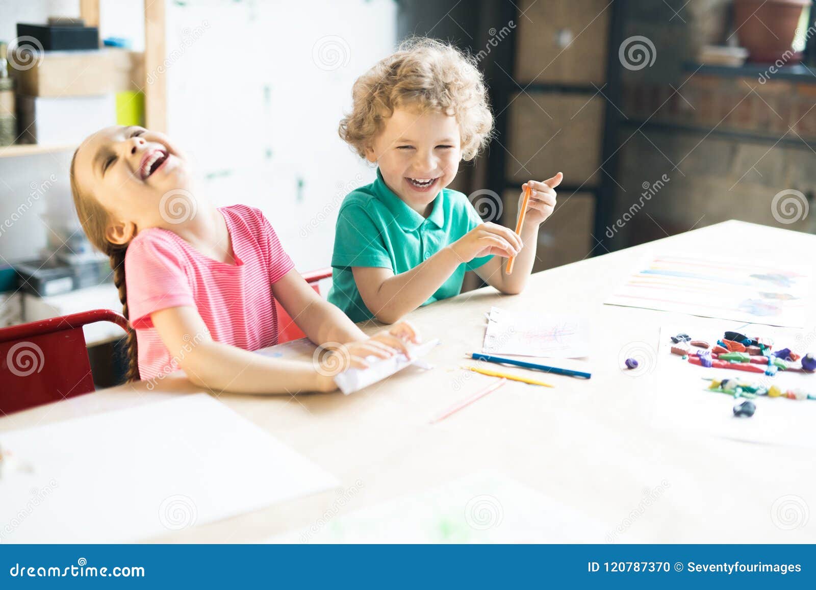 Laughing Kids Drawing At Table Stock Photo Image Of Childhood