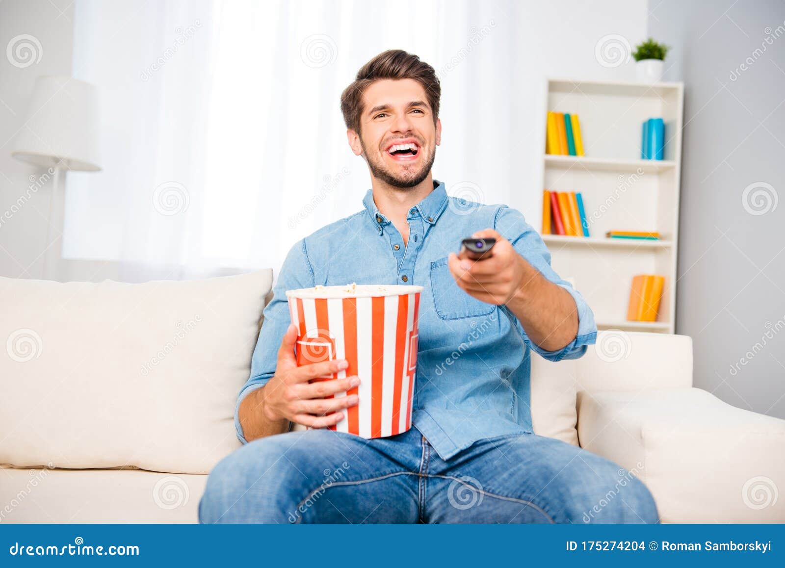 Laughing Man Watching Comedy and Eating Popcorn Stock Photo Image of