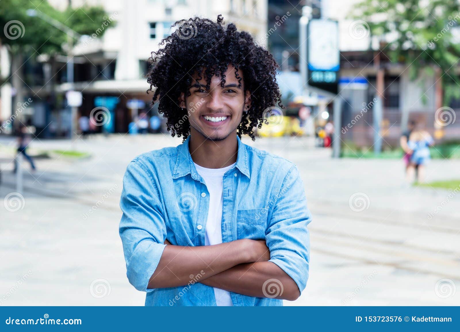 Laughing Mexican Young Adult Man with Long Curly Hair Stock Photo - Image  of handsome, camera: 153723576