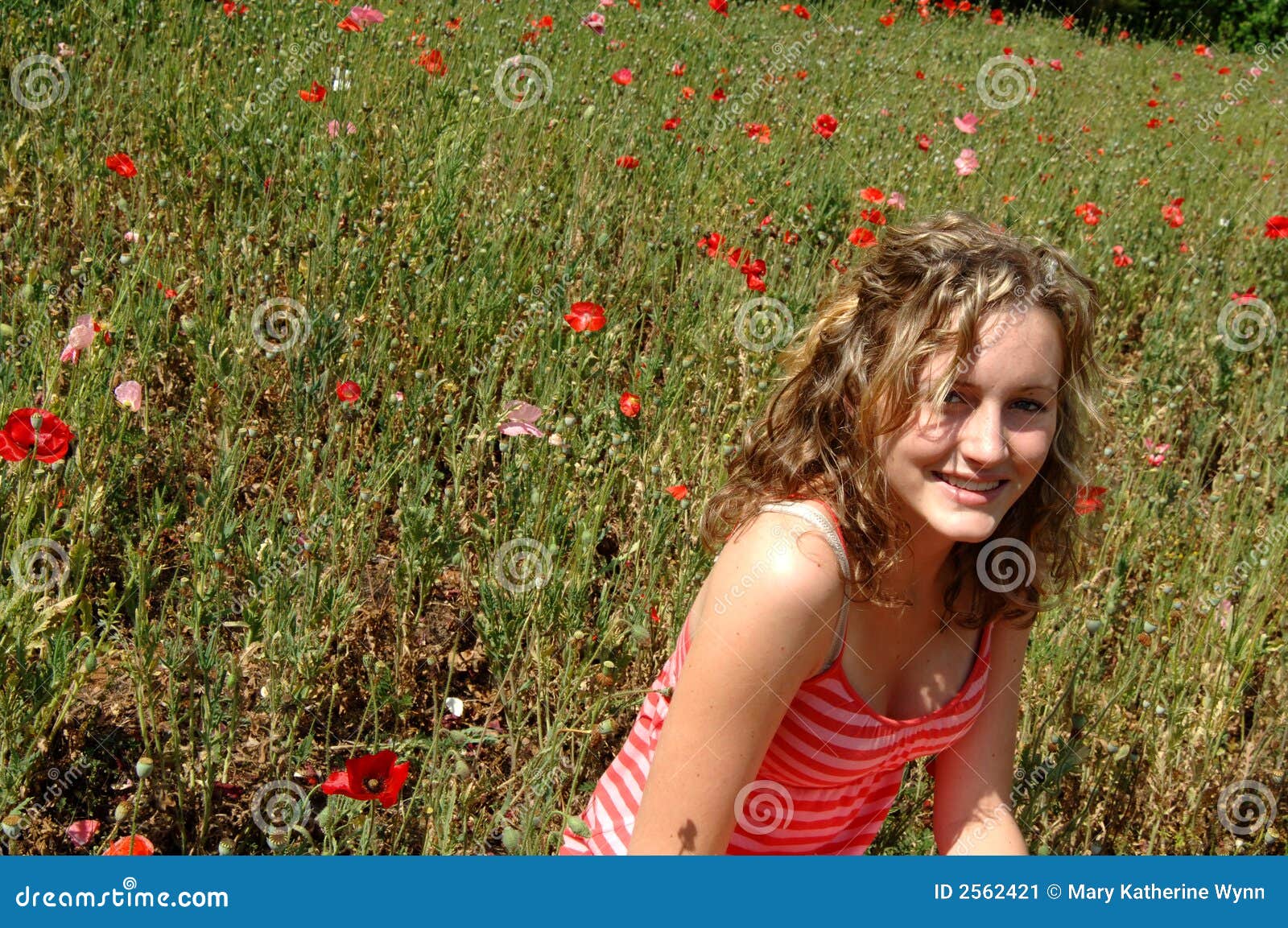Laughing Teen in Flower Field Stock Image Image of peaceful, breezy
