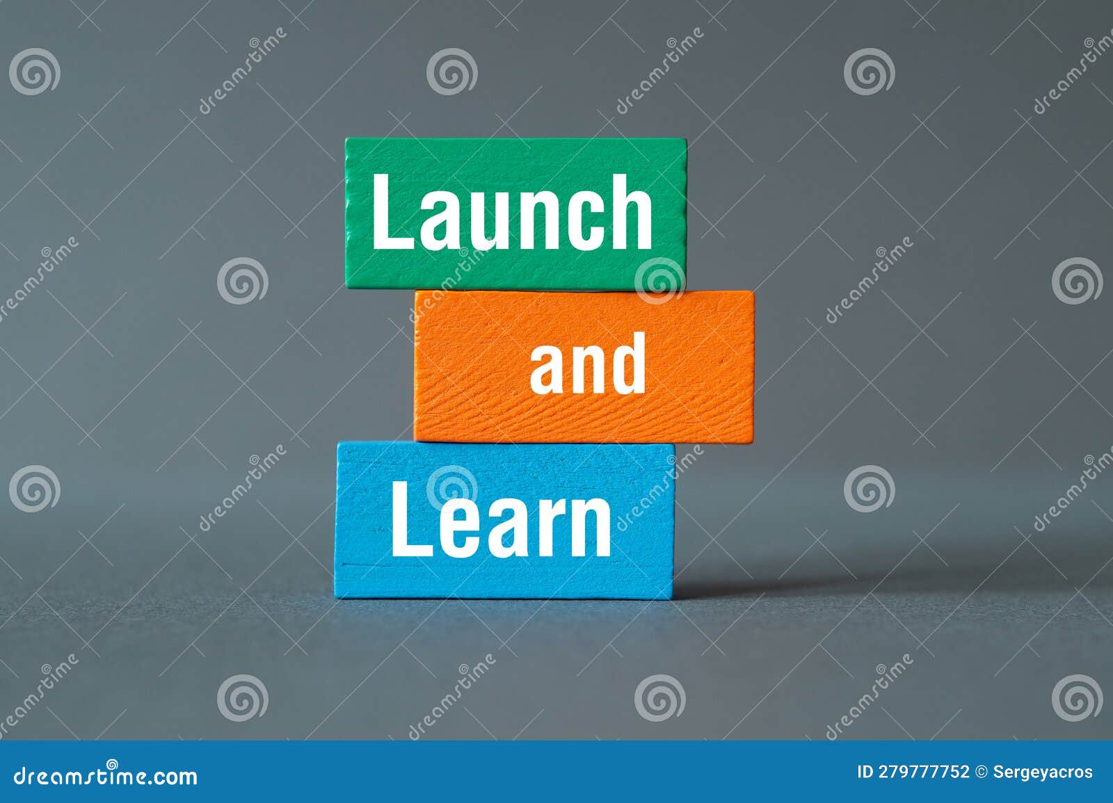 Launch and Learn - Word Concept on Building Blocks, Text Stock Photo