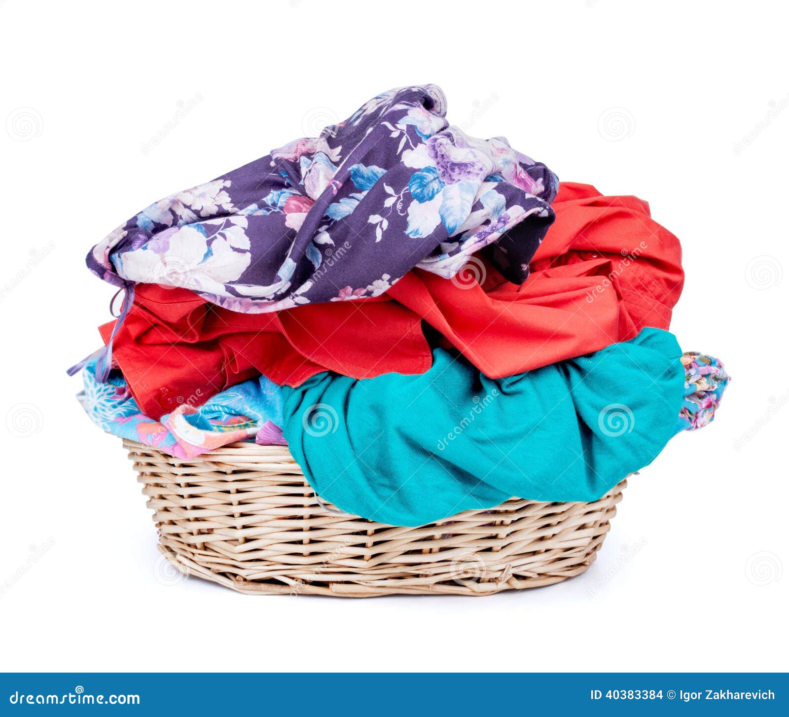 Laundry Basket Of Clothes/ Horizontal Shot Isolated On