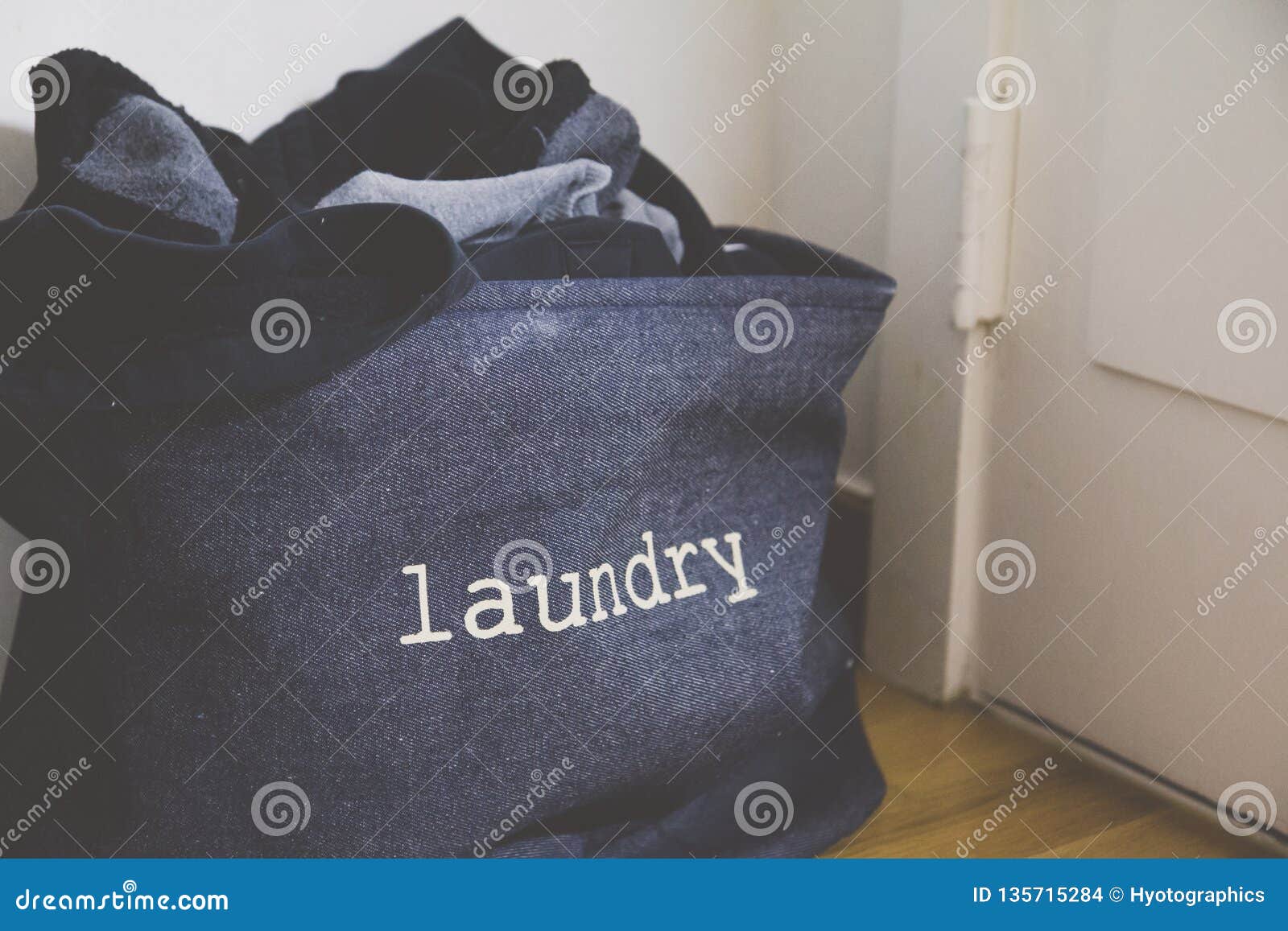 A Laundry Basket in the Living Room Stock Photo Image of equipment, isolated 135715284