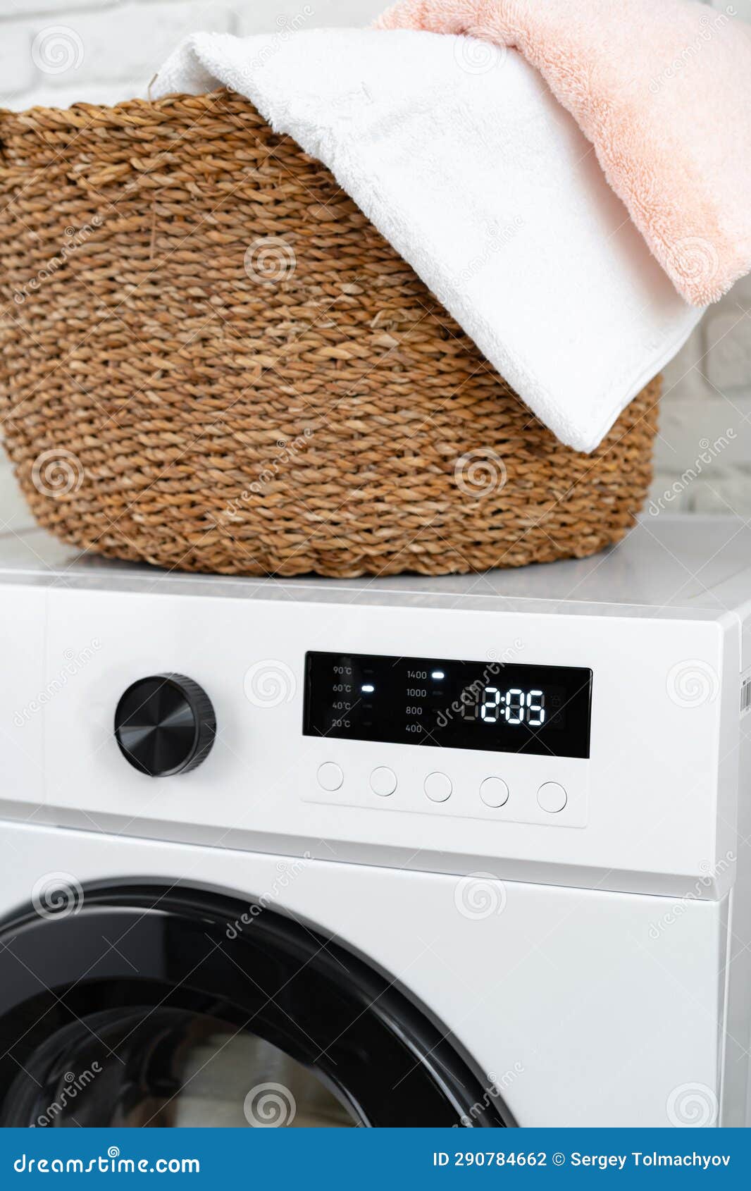 Laundry Basket on Washing Machine in a Laundry Room Stock Photo Image