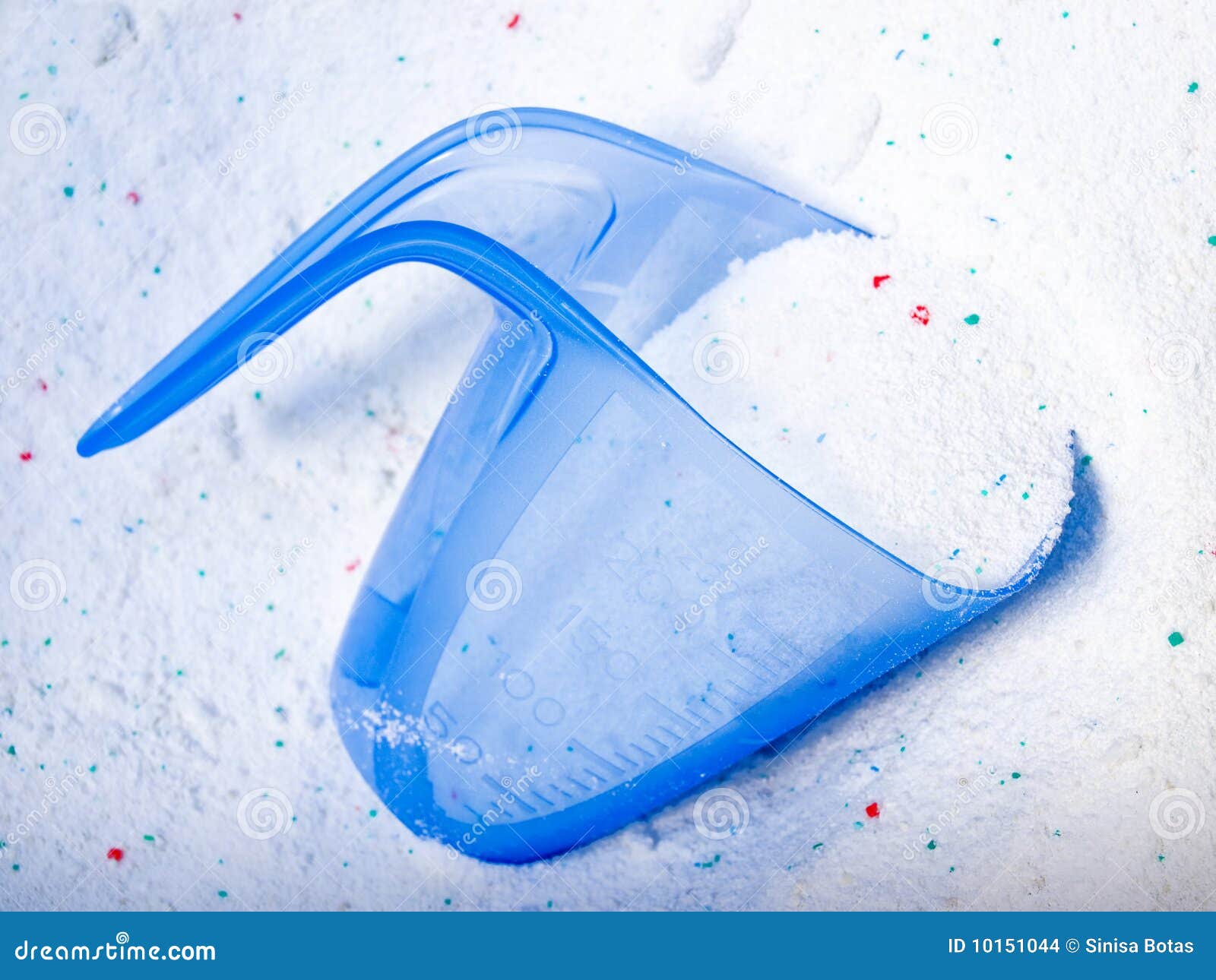 Laundry Detergent Or Washing Powder In A Blue Measuring Cup On A Kitchen  Counter Top Stock Photo, Picture and Royalty Free Image. Image 22949907.