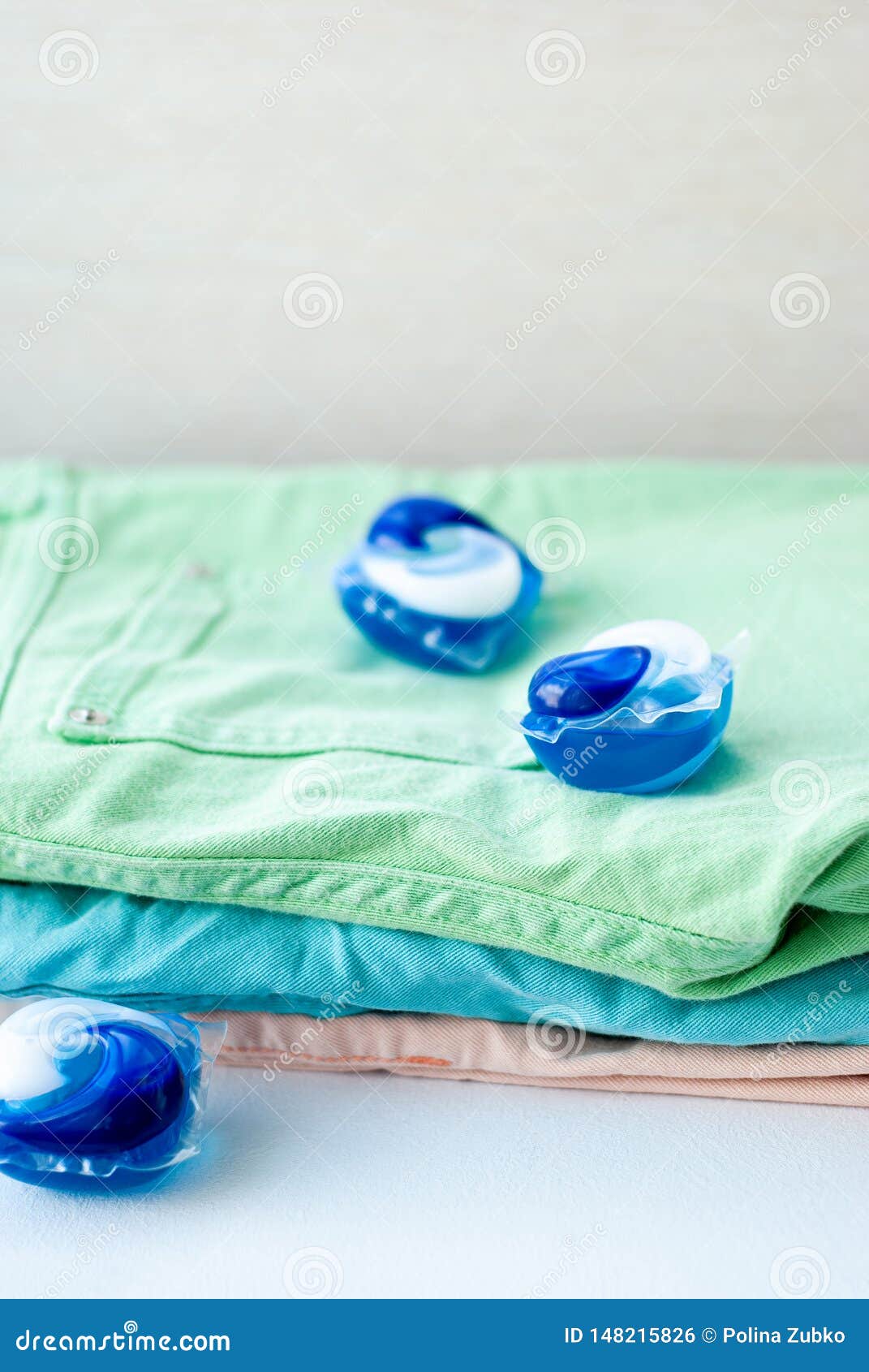 Laundry and Detergent Capsule Pod on Jeans Stock Photo Image of heap