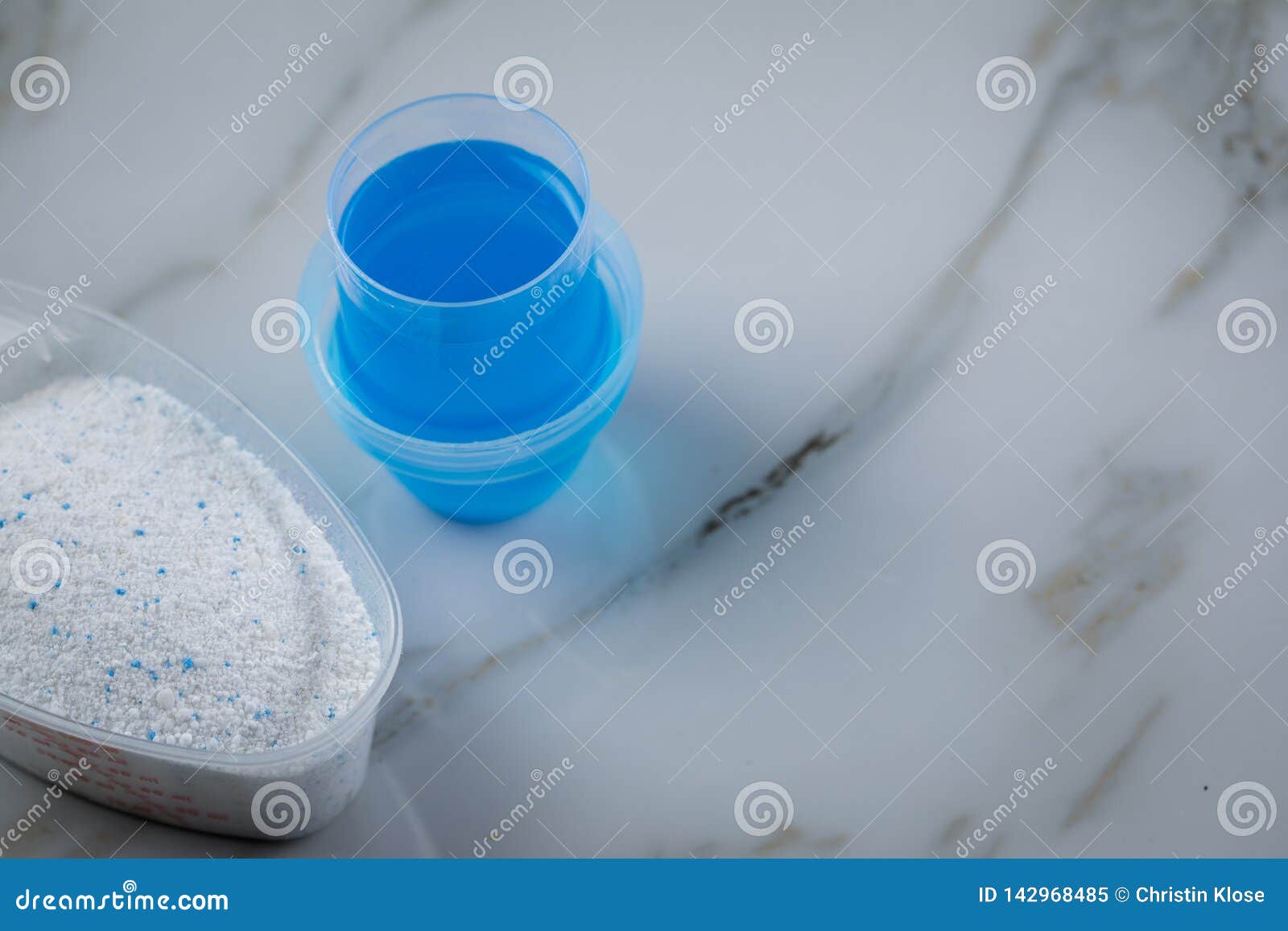 Laundry Detergent Powder and Blue Liquid Gel in Measuring Cup Stock Image Image of cleanup