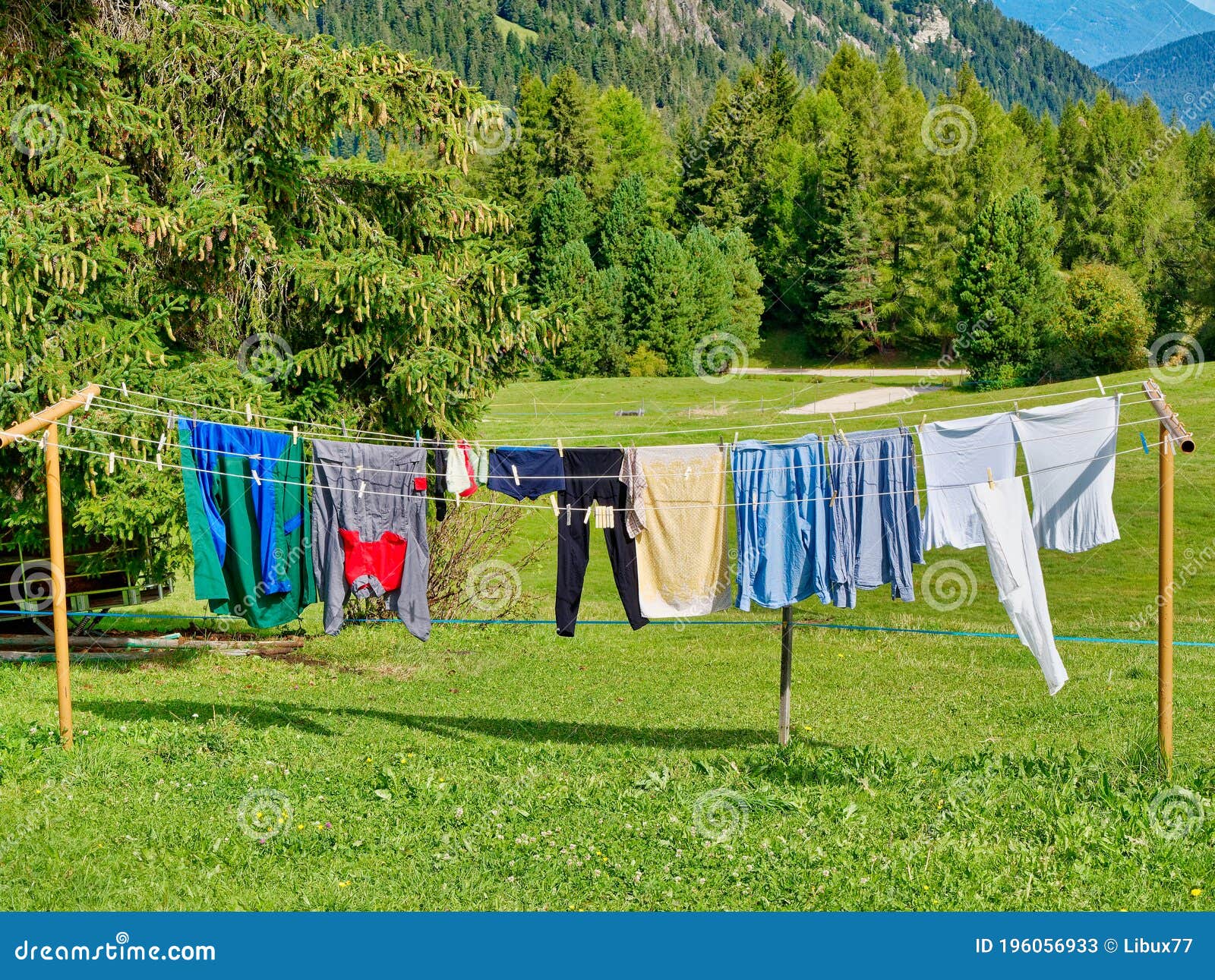 Laundry Hanging On Clothesline Outdoor In The Green Nature Stock Image