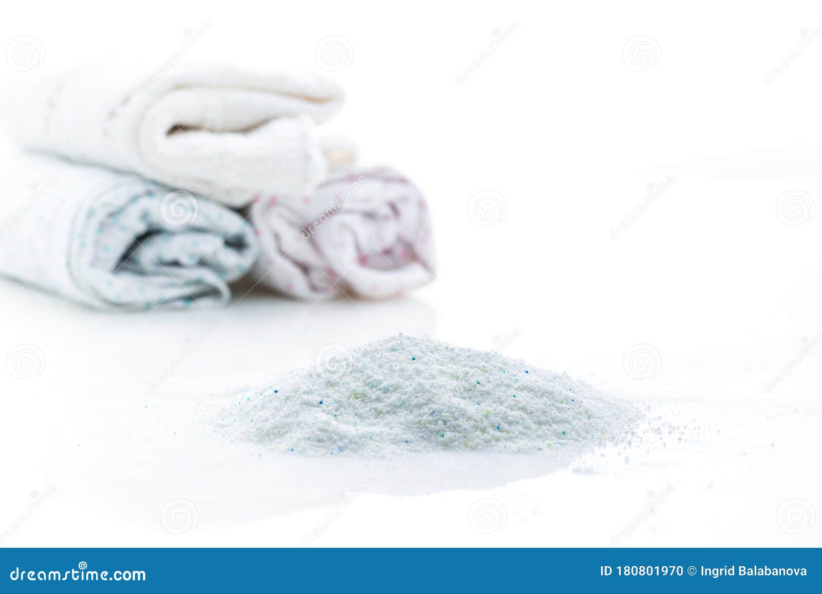 Laundry Washing Powder with Clothes Isolated on White Stock Photo