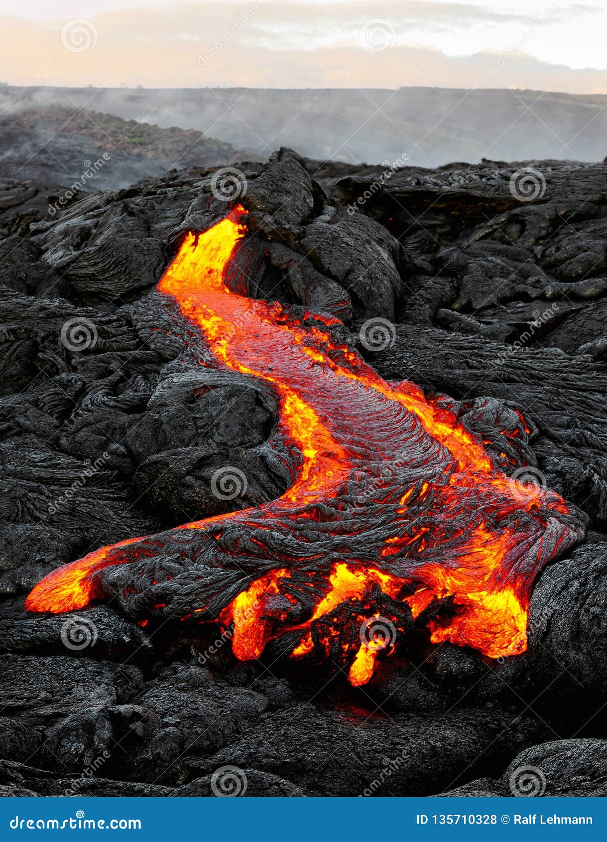 hawaii - lava emerges from a column of the earth