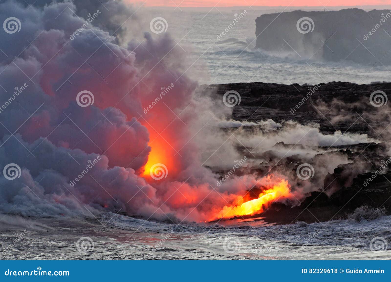 lava flowing into ocean - kilauea volcano, hawaii