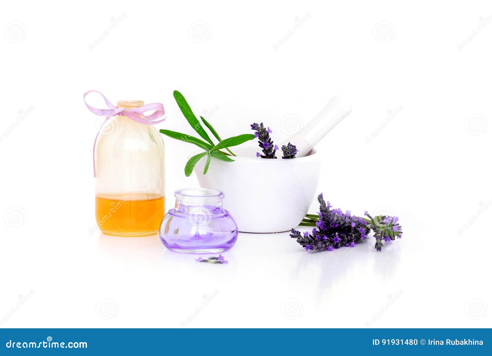 lavender flowers, lavander extract, oil and montar with dry flowers  on white