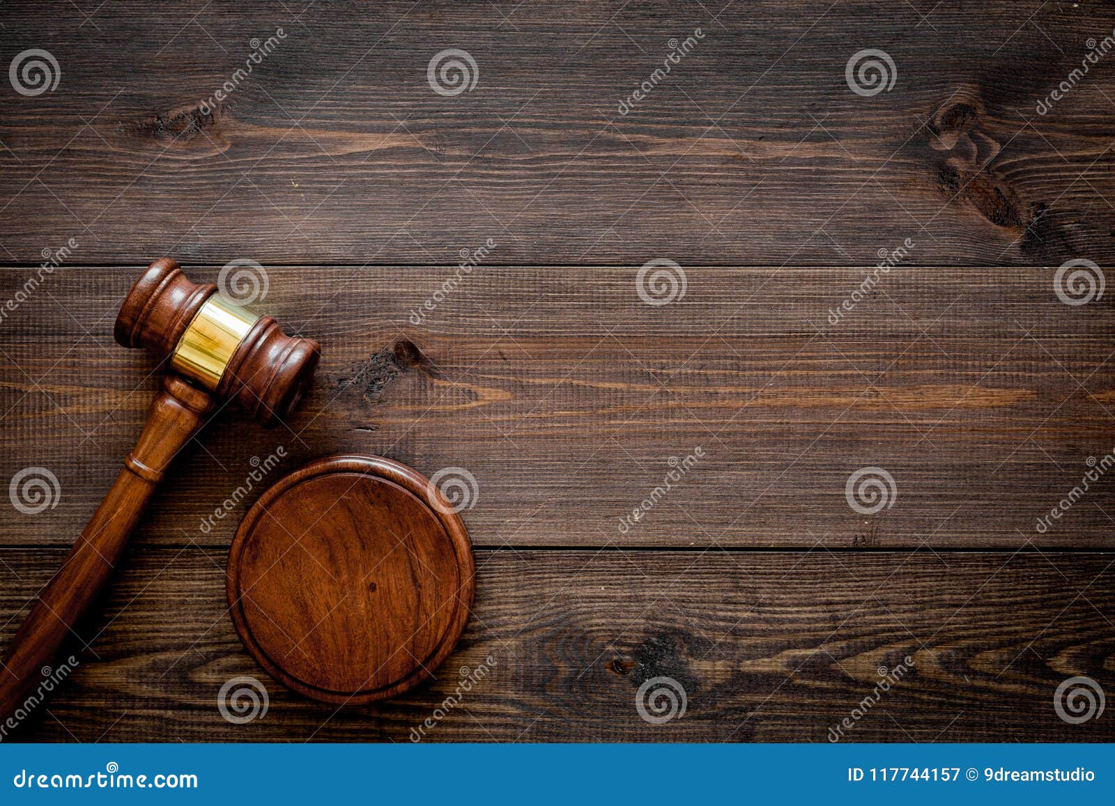 law or jurisprudence concept. judge gavel on dark wooden background top view copy space