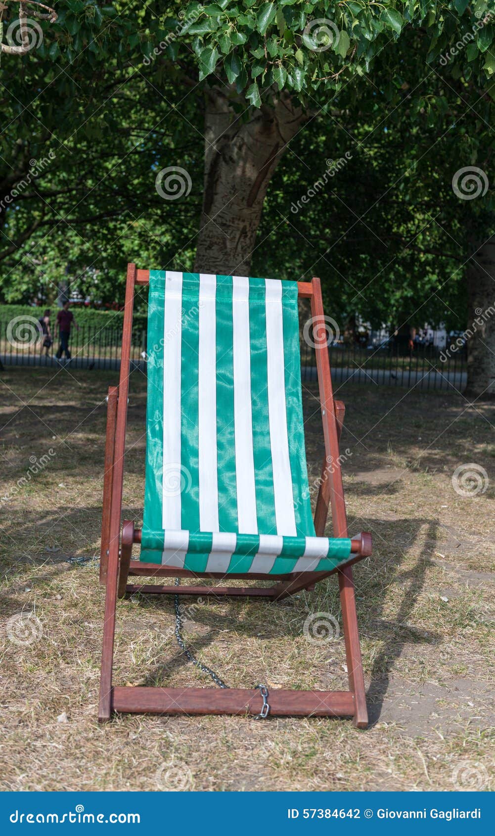 Lawn chair in a park stock photo. Image of green, relaxation 57384642