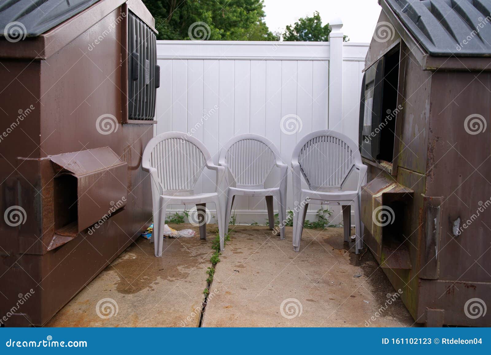 Lawn Chairs by Dumpsters stock image. Image of market 161102123