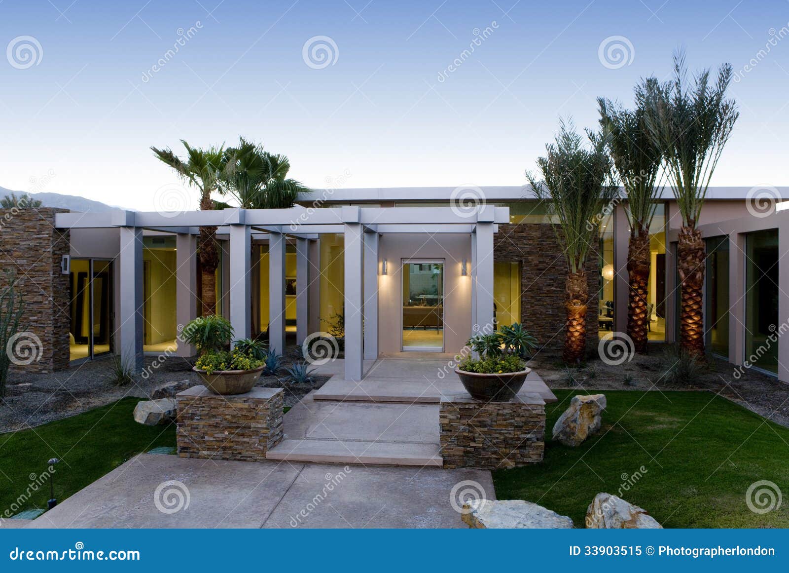 Lawn And Walkway In Front Of Modern House Royalty Free ...