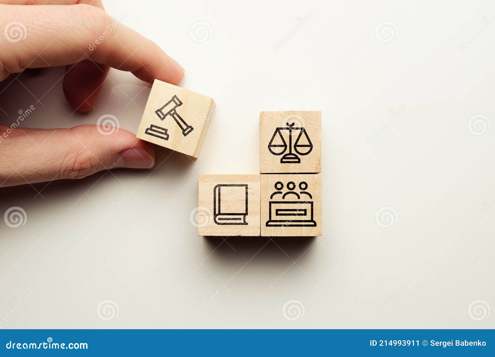 lawsuit concept with jury icons, law book on wooden cubes