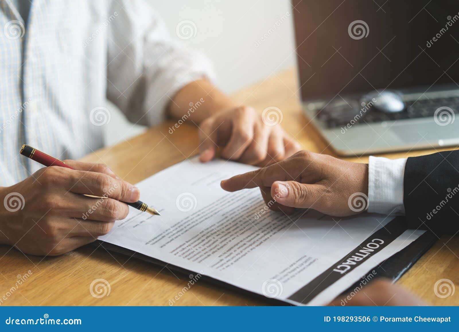 Lawyer Consulting To Client before Sign Business Contract in the Office