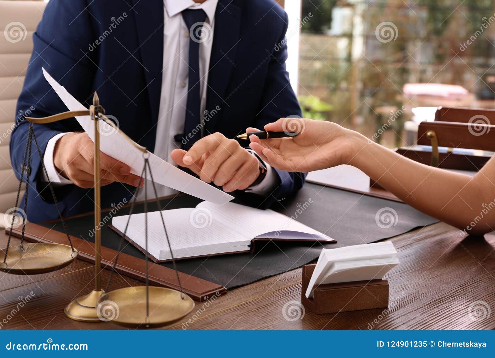 Lawyer Working with Client at Table in Office Stock Image Image of