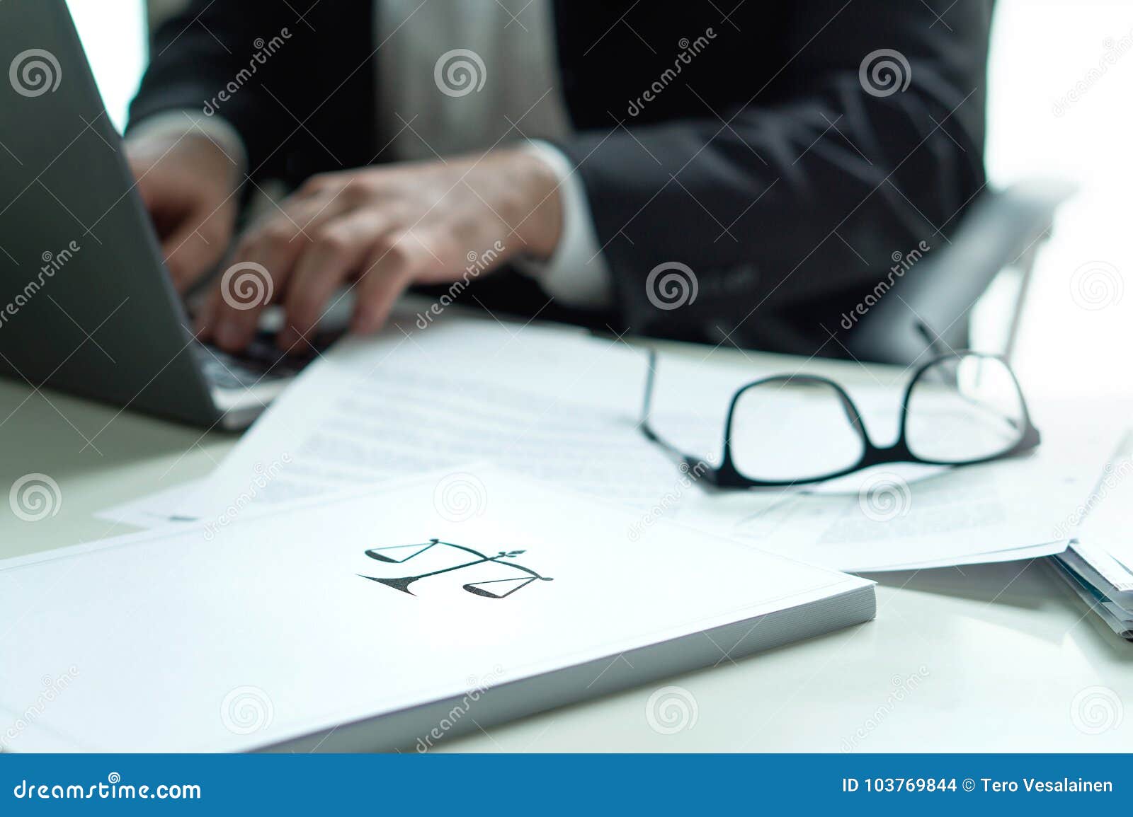 lawyer working in office. attorney writing a legal document.