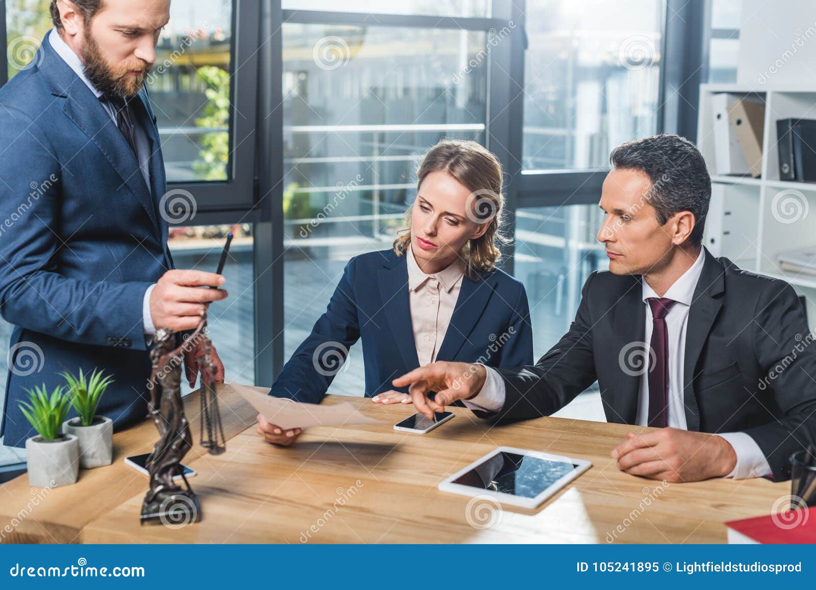 Lawyers Discussing Contract in Office Stock Image Image of smartphone