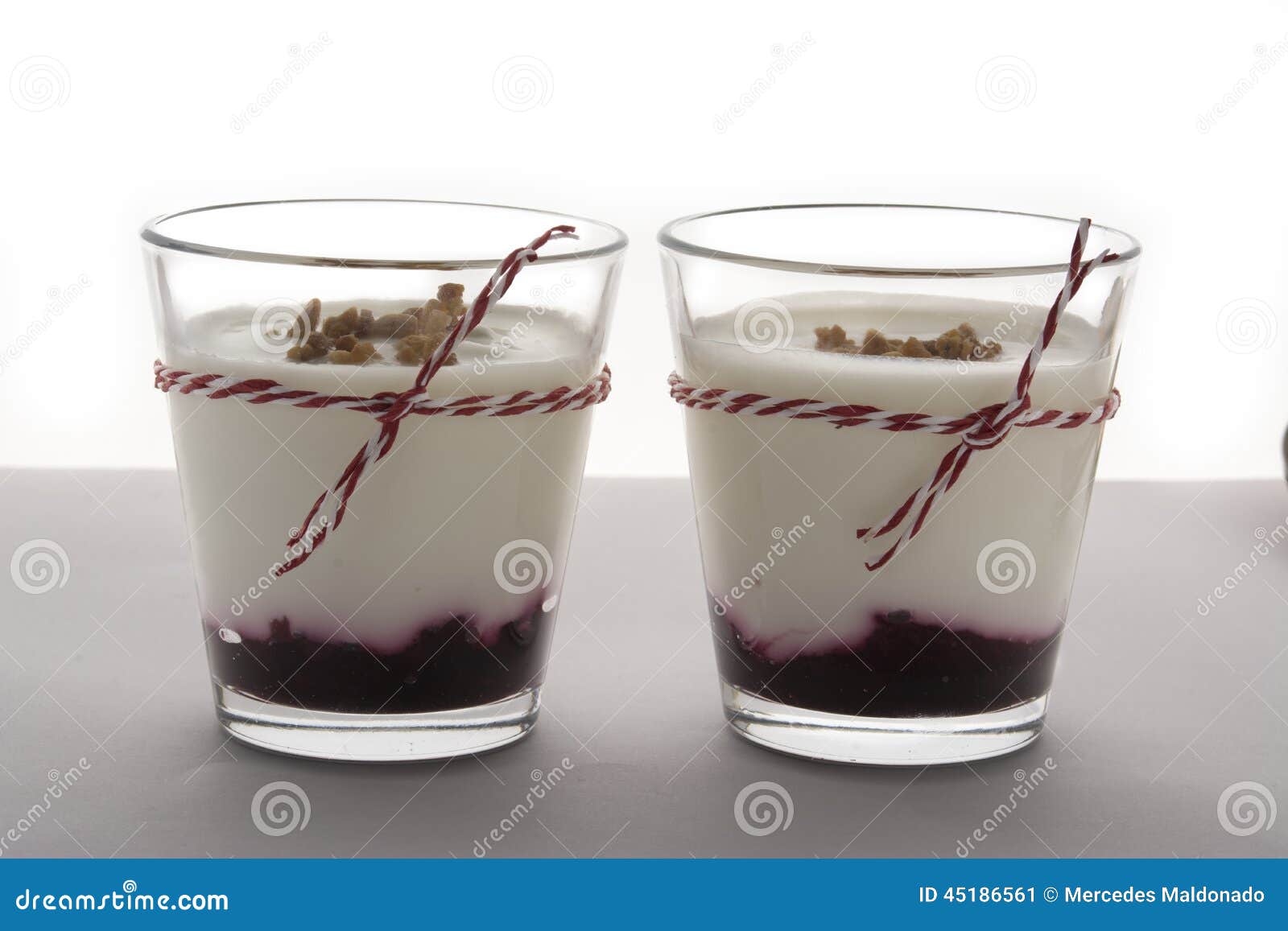 Layered Dessert with Fruits Yogurt and Cream Cheese in Glass Jar Stock
