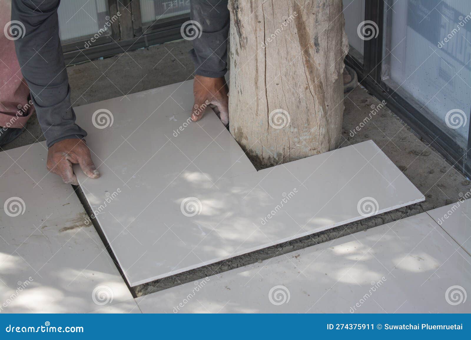 Laying Ceramic Tiles on Floor Stock Image Image of tiles, human