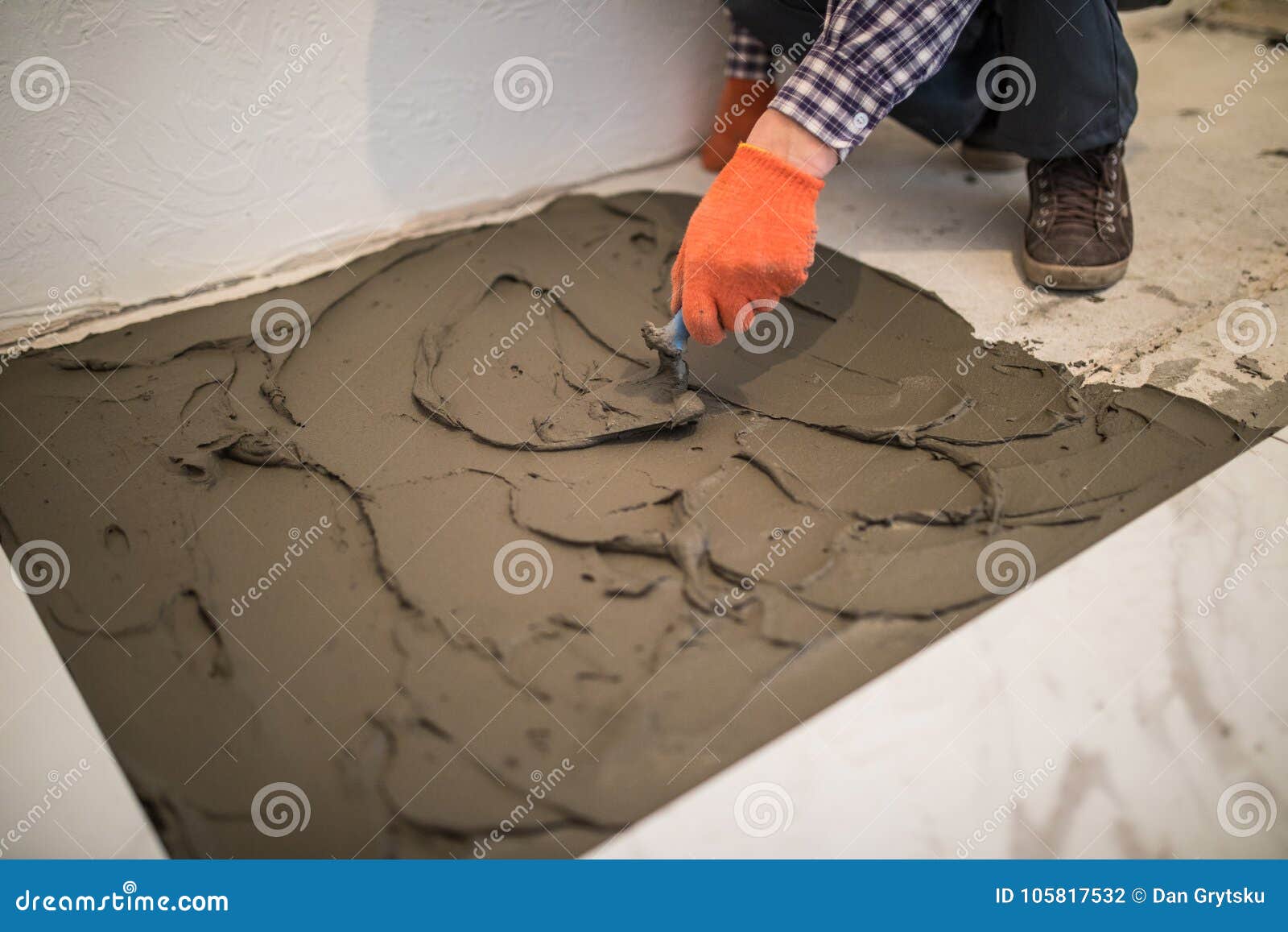 Laying Ceramic Tiles Master Make Concrete Floor In Preparation