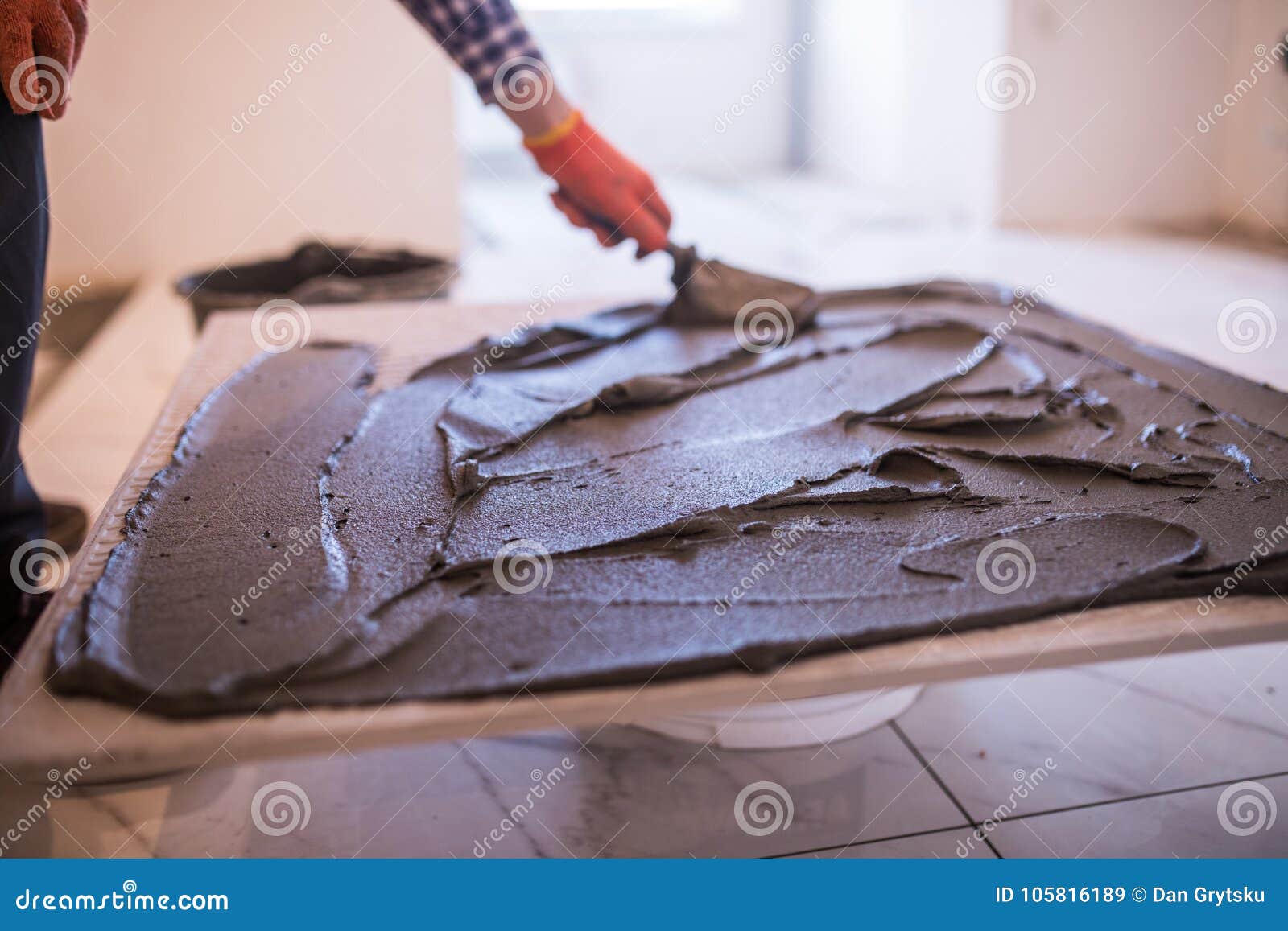 Laying Ceramic Tiles Worker Make Preparation For Laying Floor