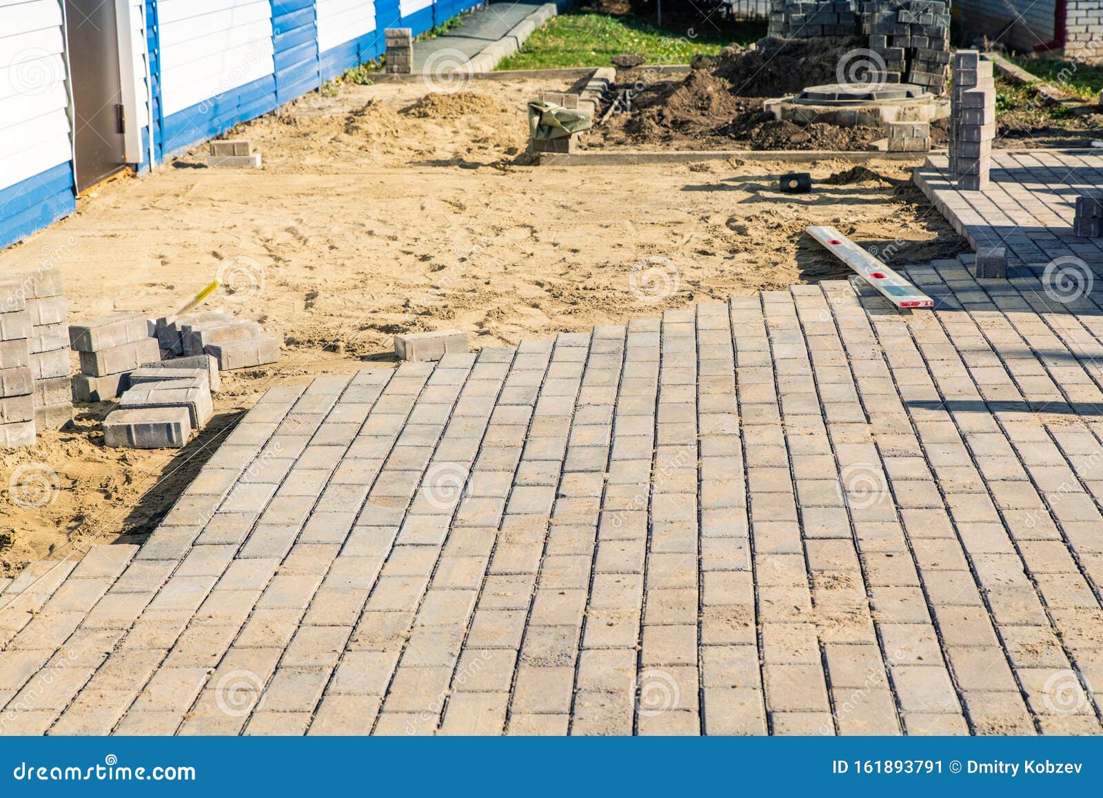 how to lay concrete slabs on sand