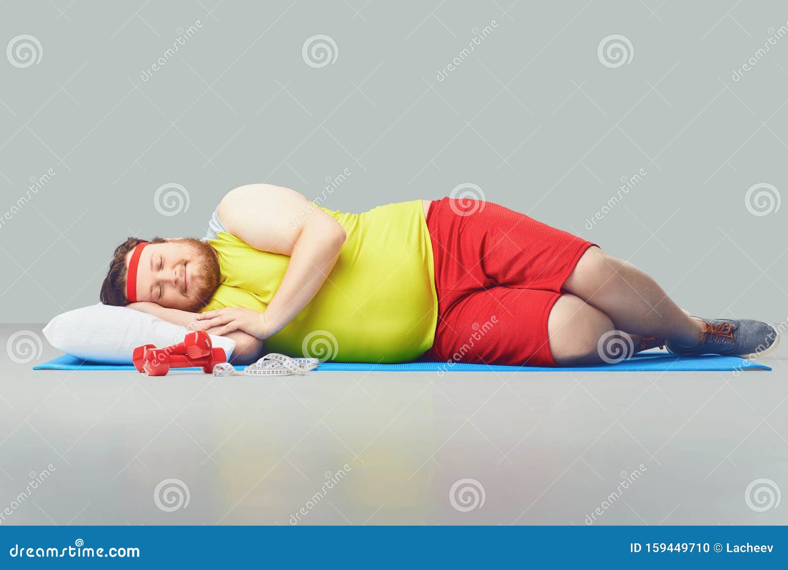 Lazy Fat Funny Man is Sleeping on a Gray Background. Stock Photo - Image of  lying, exercise: 159449710